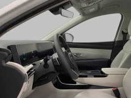 Hyundai Tucson Hybrid Blue SE AWD 2026 — side view