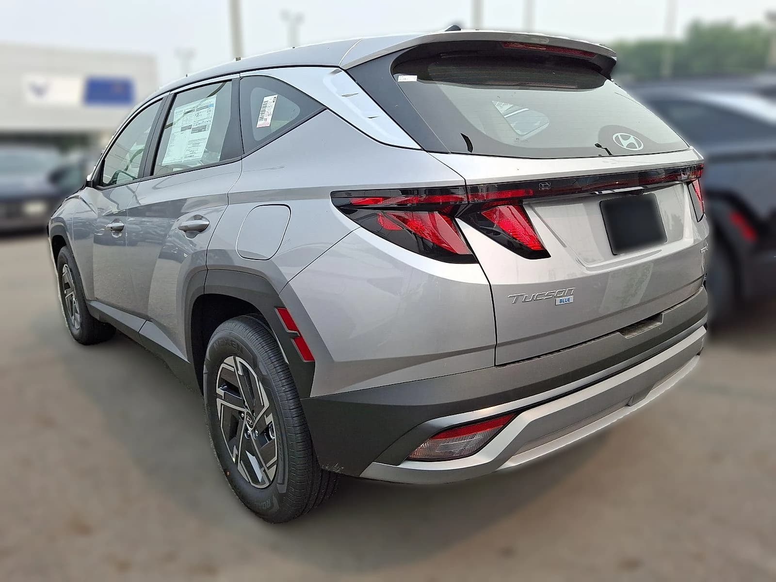 Hyundai Tucson Hybrid Blue SE AWD 2026 — side view