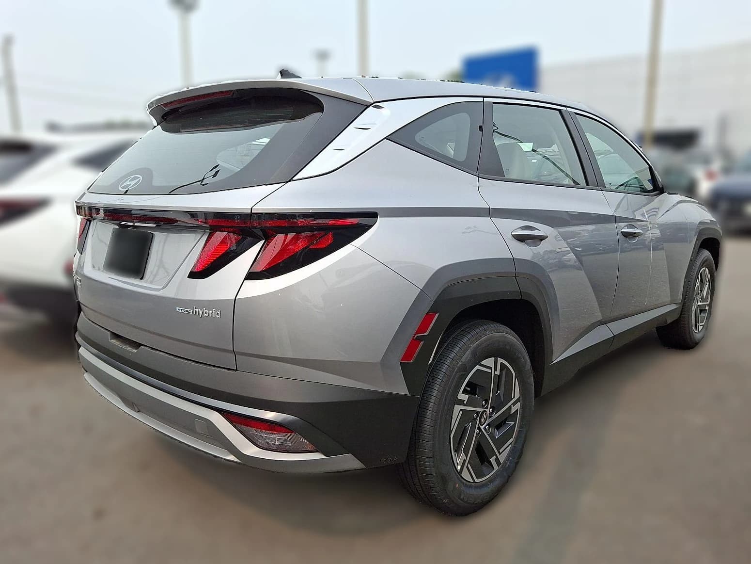 Hyundai Tucson Hybrid Blue SE AWD 2026 — side view