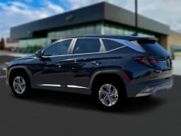 Hyundai Tucson Hybrid Blue SE AWD 2026 — side view