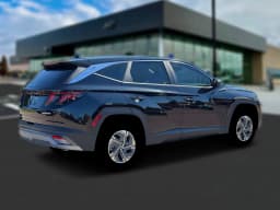 Hyundai Tucson Hybrid Blue SE AWD 2026 — side view