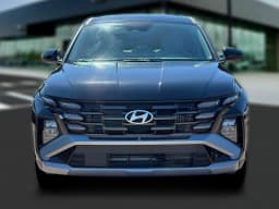 Hyundai Tucson Hybrid Blue SE AWD 2026 — side view