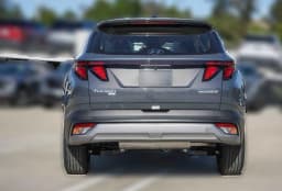 Hyundai Tucson Hybrid Blue SE AWD 2026 — side view