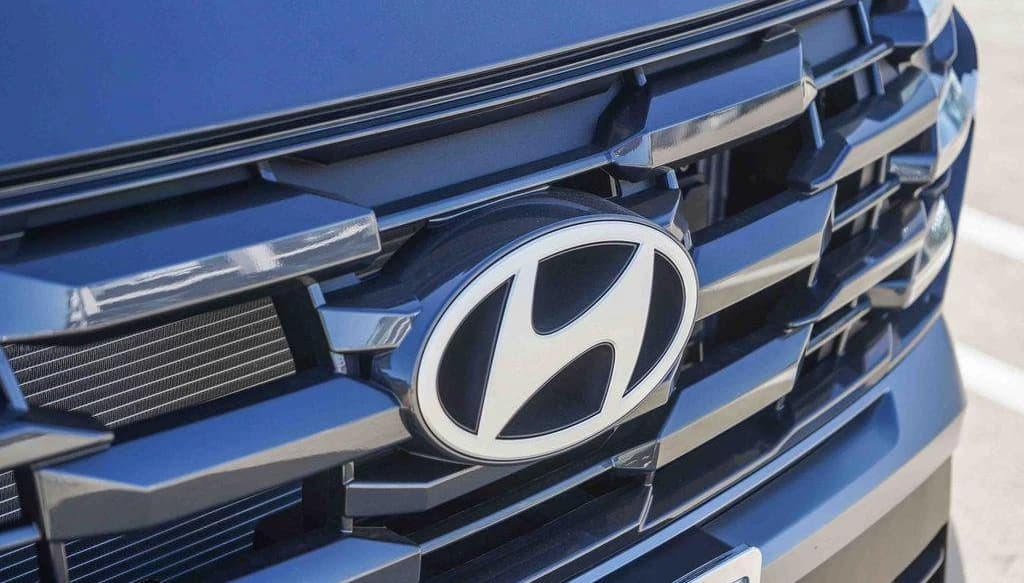 Hyundai Tucson Hybrid Blue SE AWD 2026 — side view