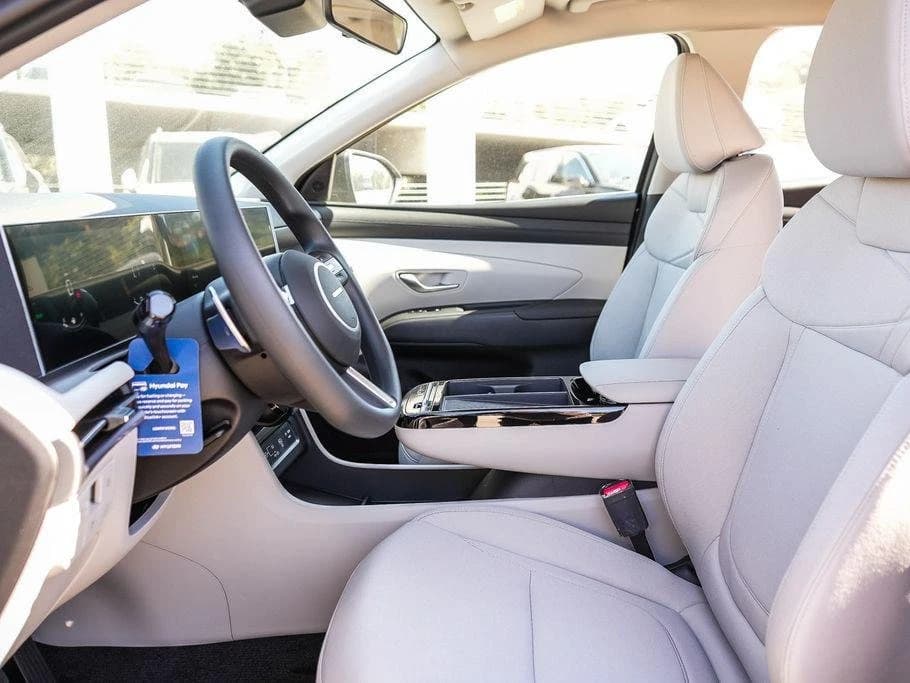 Hyundai Tucson Hybrid Blue SE AWD 2026 — side view