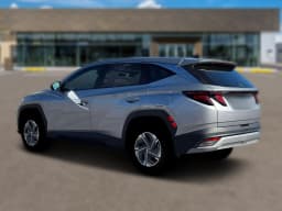 Hyundai Tucson Hybrid Blue SE AWD 2026 — side view