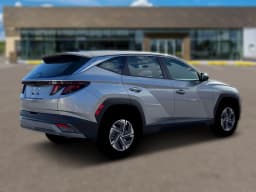 Hyundai Tucson Hybrid Blue SE AWD 2026 — side view