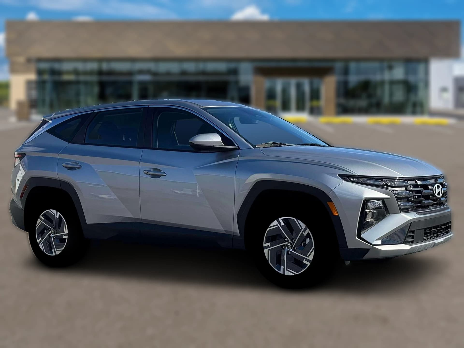 Hyundai Tucson Hybrid Blue SE AWD 2026 — side view
