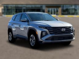 Hyundai Tucson Hybrid Blue SE AWD 2026 — side view