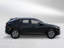 Hyundai Tucson Hybrid Blue SE AWD 2026 — side view