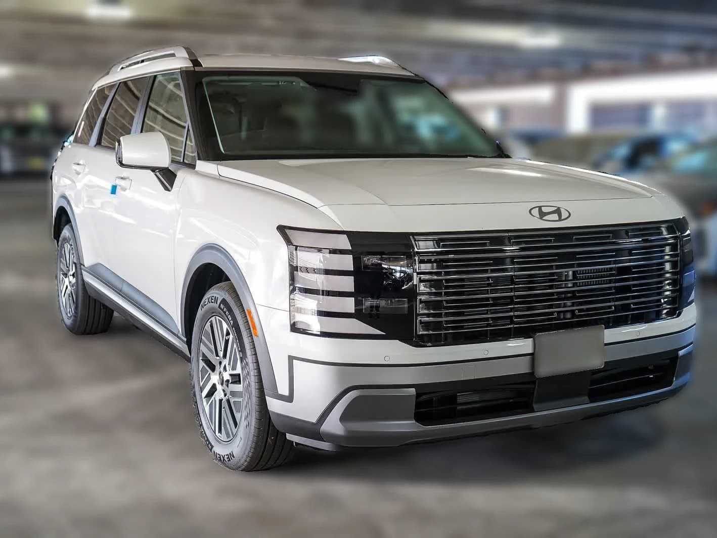 Hyundai Palisade Hybrid Blue SEL 7P FWD 2026 — side view