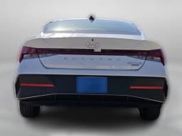 Hyundai Elantra Hybrid Blue Sedan 2026 — side view