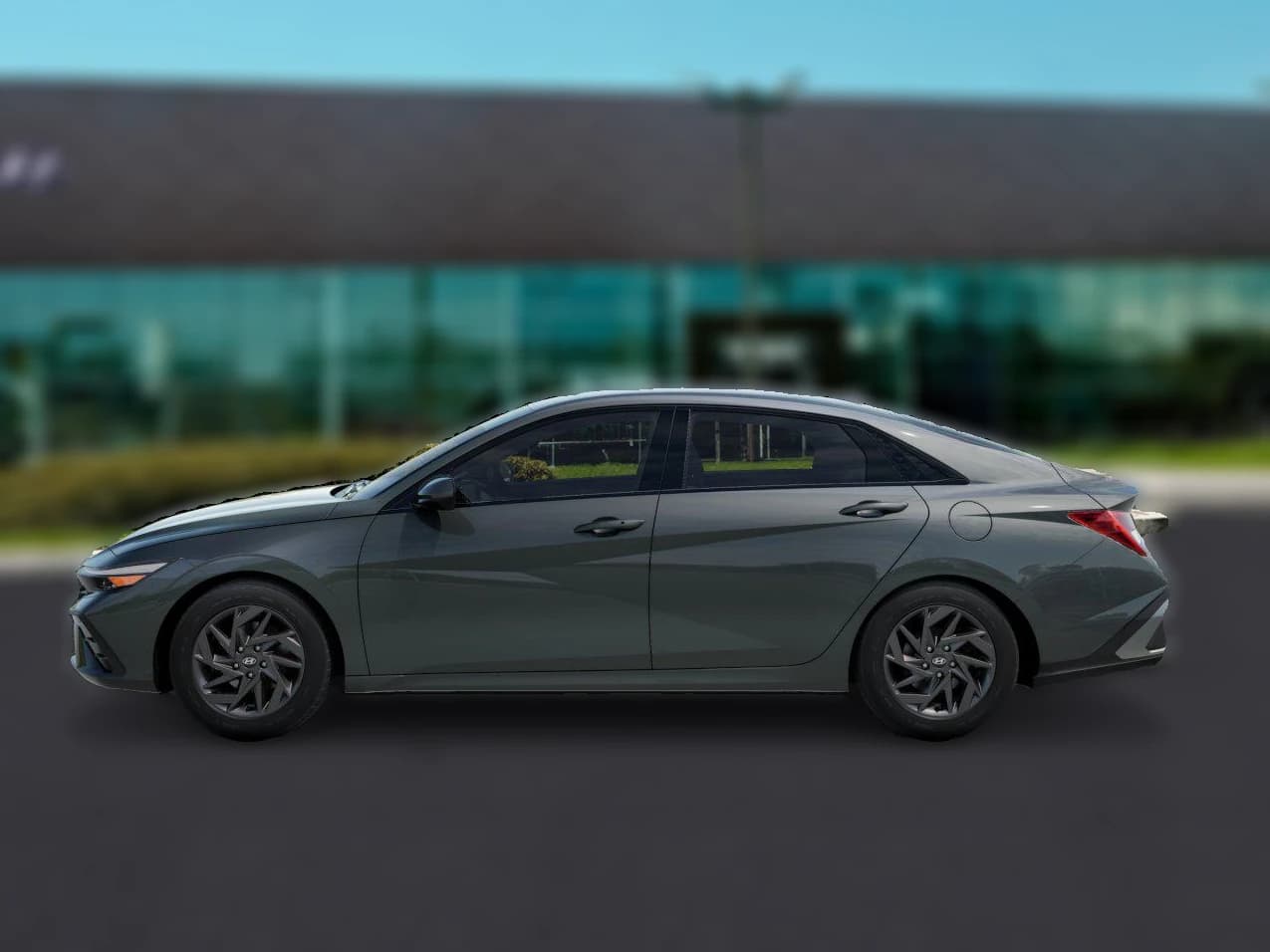 Hyundai Elantra Hybrid Blue Sedan 2026 — side view