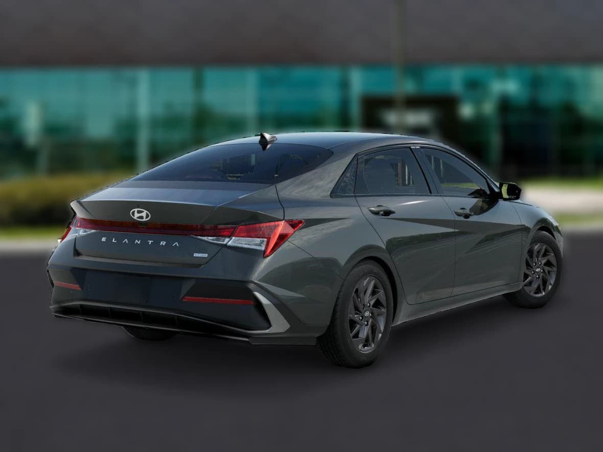 Hyundai Elantra Hybrid Blue Sedan 2026 — side view