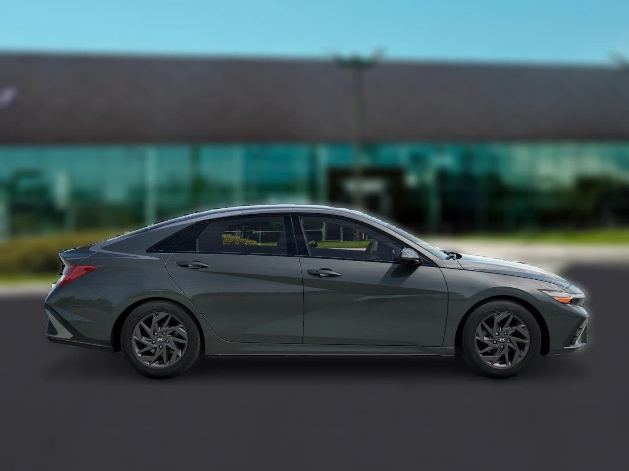 Hyundai Elantra Hybrid Blue Sedan 2026 — side view
