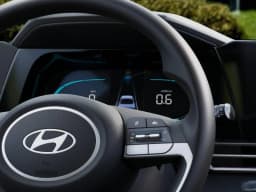 Hyundai Elantra Hybrid Blue Sedan 2026 — side view