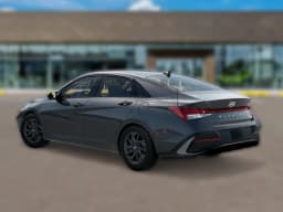 Hyundai Elantra Hybrid Blue Sedan 2026 — side view