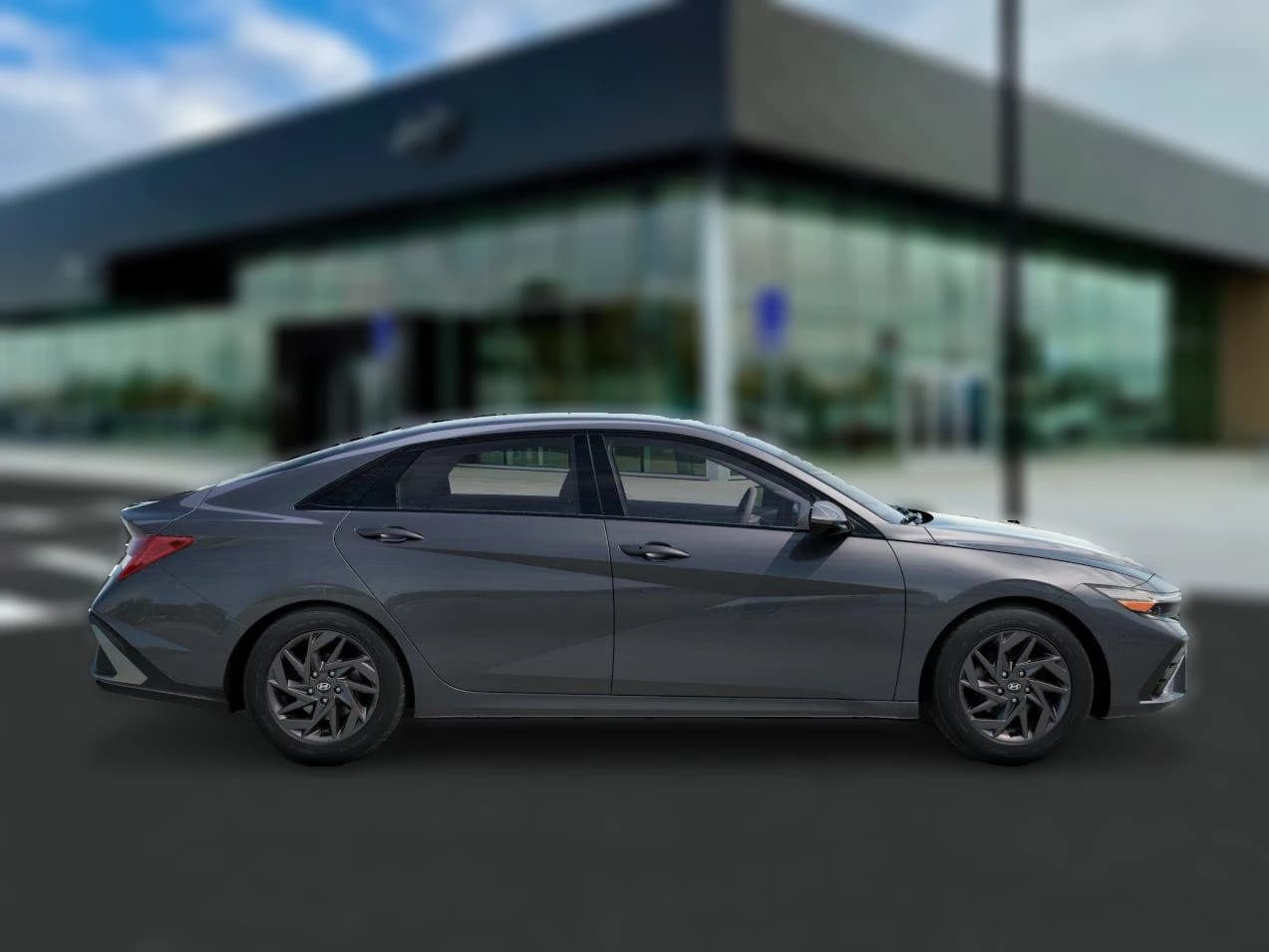 Hyundai Elantra Hybrid Blue Sedan 2026 — side view