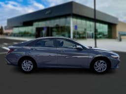 Hyundai Elantra Hybrid Blue Sedan 2026 — side view