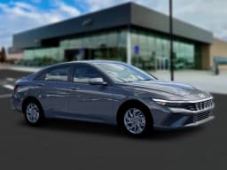 Hyundai Elantra Hybrid Blue Sedan 2026 — side view