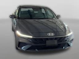 Hyundai Elantra Hybrid Blue Sedan 2026 — side view
