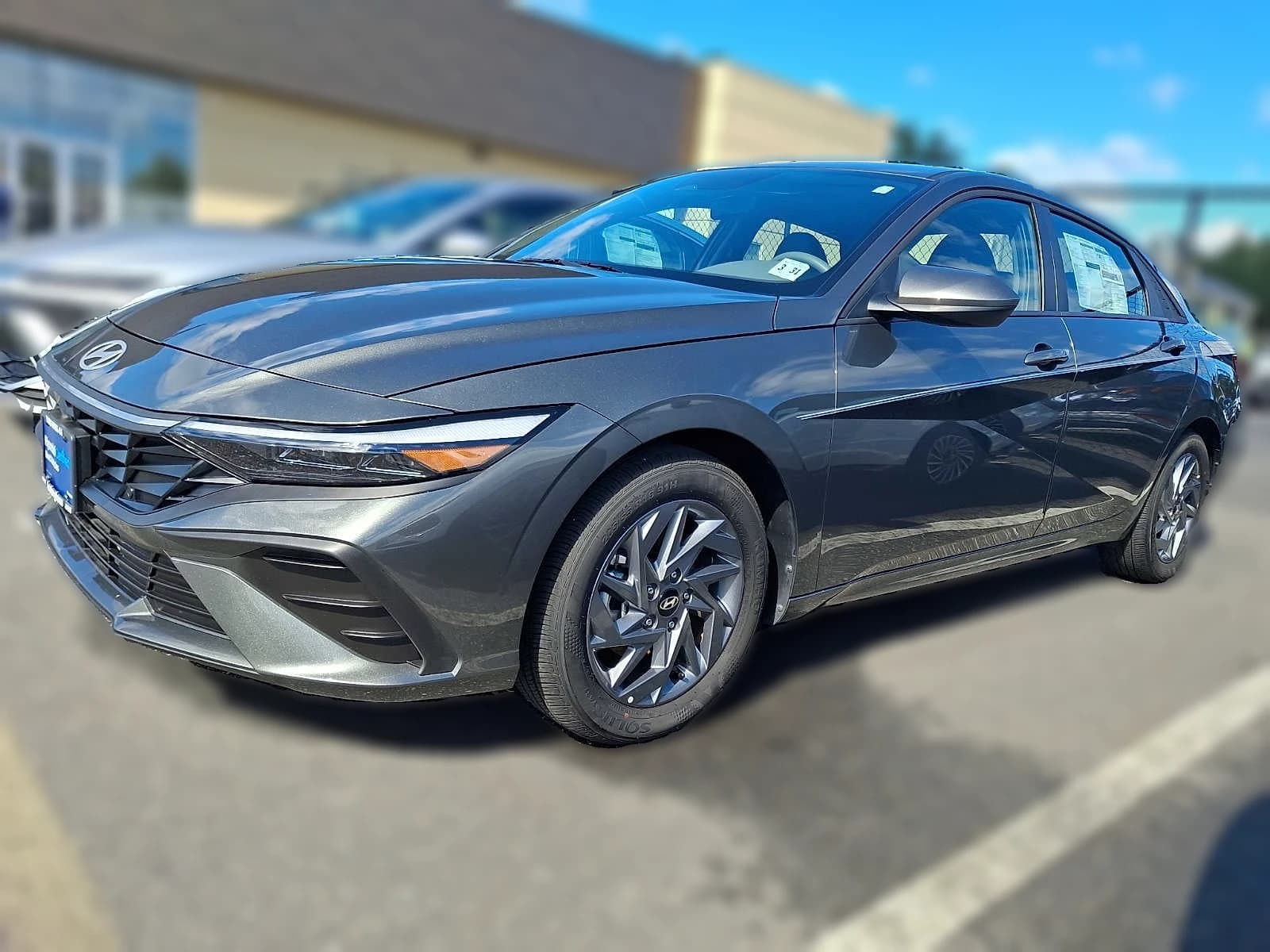 Hyundai Elantra Hybrid Blue Sedan 2026 — side view