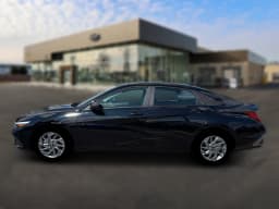 Hyundai Elantra Hybrid Blue Sedan 2026 — side view