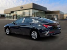 Hyundai Elantra Hybrid Blue Sedan 2026 — side view
