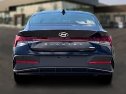 Hyundai Elantra Hybrid Blue Sedan 2026 — side view