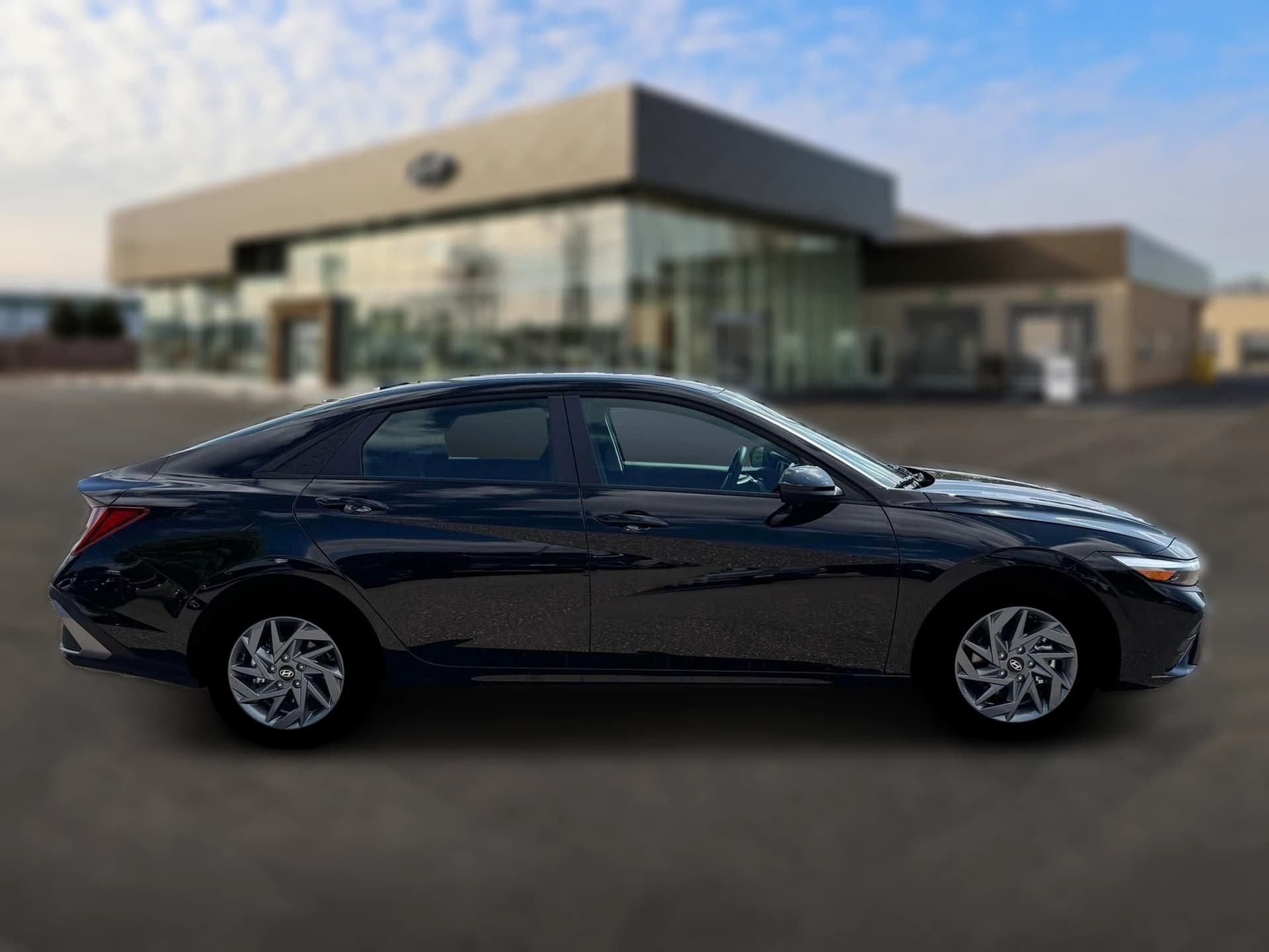 Hyundai Elantra Hybrid Blue Sedan 2026 — side view