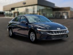 Hyundai Elantra Hybrid Blue Sedan 2026 — side view