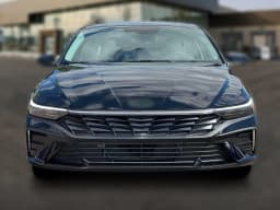 Hyundai Elantra Hybrid Blue Sedan 2026 — side view