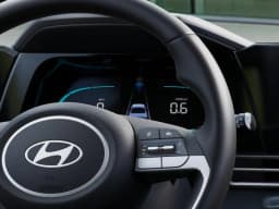 Hyundai Elantra Hybrid Blue Sedan 2026 — side view
