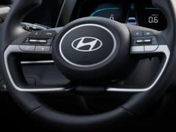 Hyundai Elantra Hybrid Blue Sedan 2026 — side view