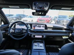 Genesis G90 3.5T e-SC AWD 2026 — side view