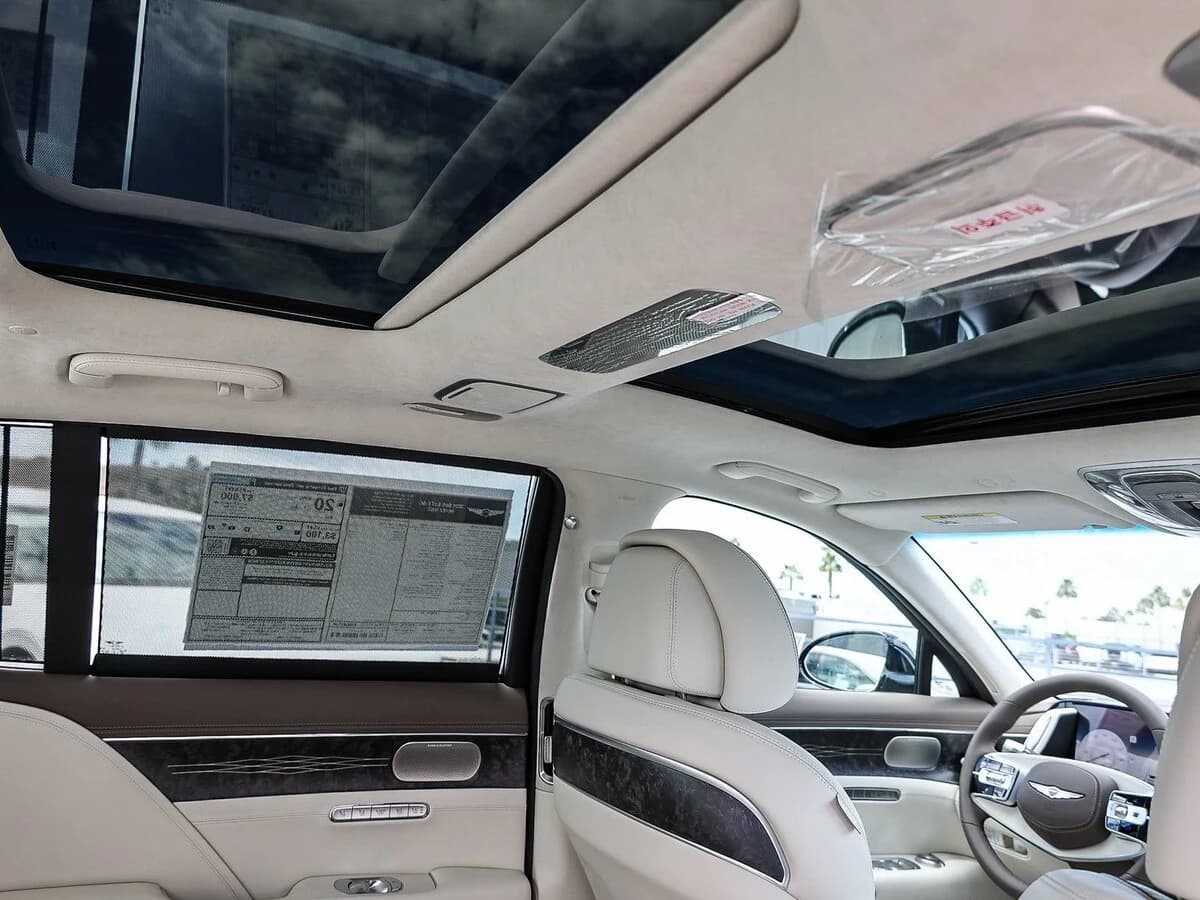 Genesis G90 3.5T e-SC AWD 2026 — side view