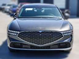 Genesis G90 3.5T e-SC AWD 2026 — side view