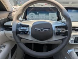Genesis G90 3.5T e-SC AWD 2026 — side view