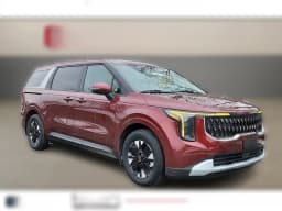 Kia Carnival Hybrid LXS FWD 2026 — side view