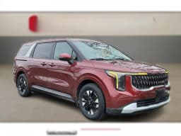Kia Carnival Hybrid LXS FWD 2026 — side view