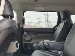 Kia Carnival Hybrid LXS FWD 2026 — side view
