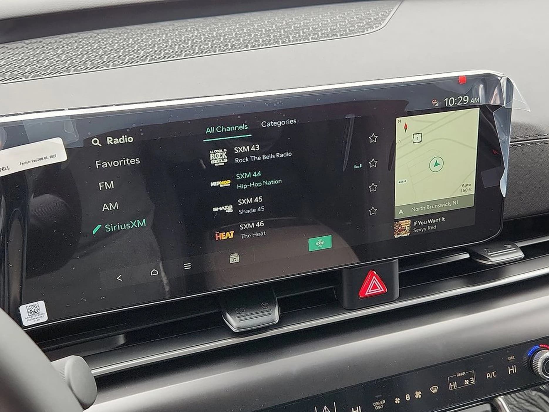 Kia Carnival Hybrid LXS FWD 2026 — side view