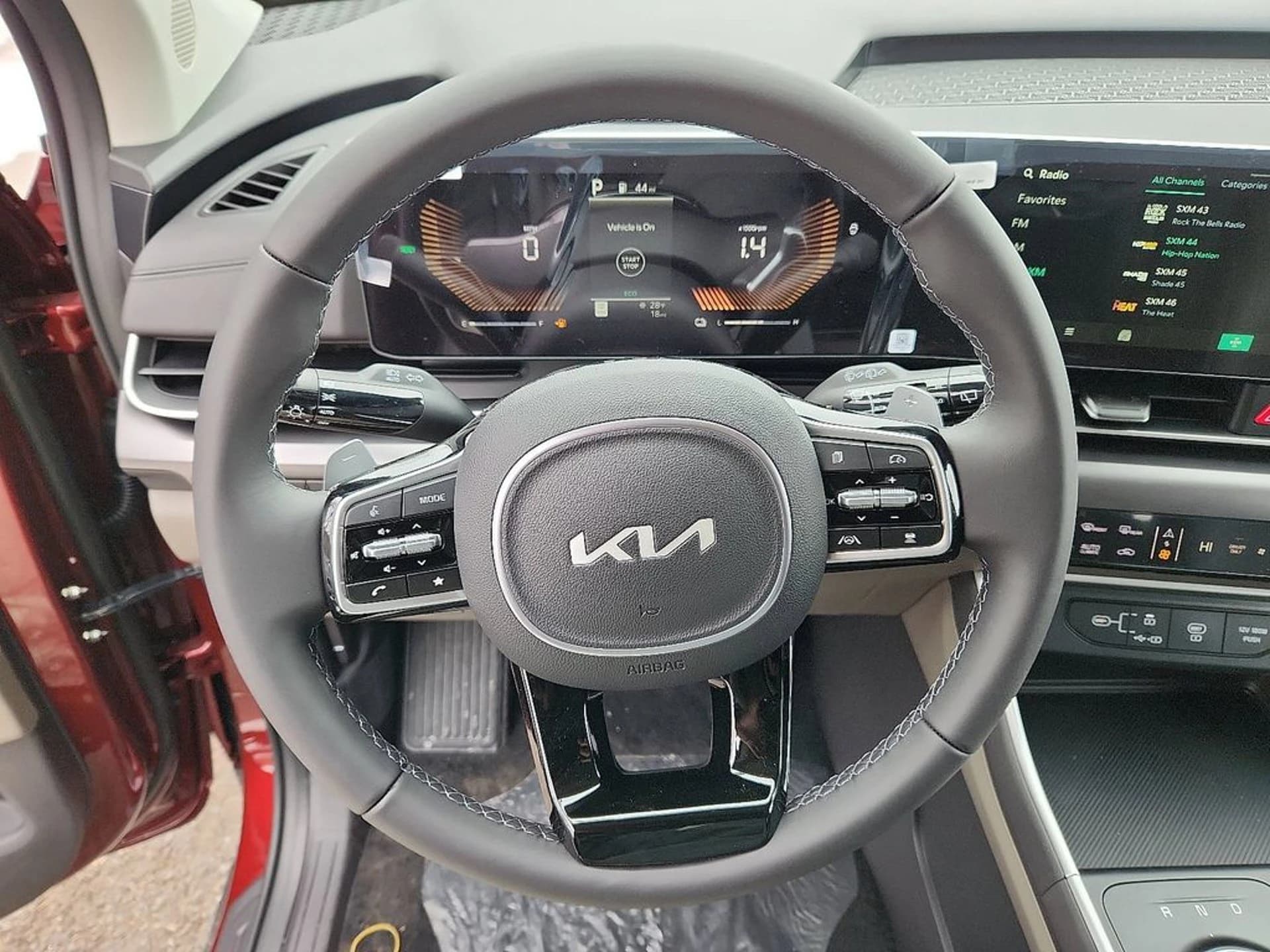 Kia Carnival Hybrid LXS FWD 2026 — side view