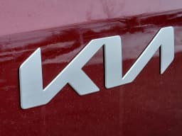 Kia Carnival Hybrid LXS FWD 2026 — side view
