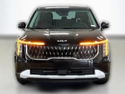 Kia Carnival Hybrid LXS FWD 2026 — side view