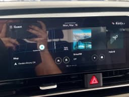 Kia Carnival Hybrid LXS FWD 2026 — side view