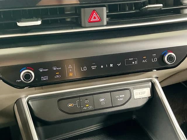 Kia Carnival Hybrid LXS FWD 2026 — side view