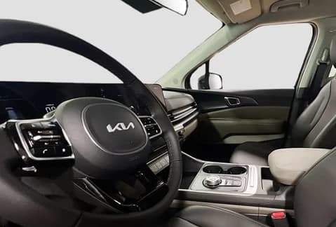 Kia Carnival Hybrid LXS FWD 2026 — side view