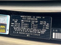 Kia Carnival Hybrid LXS FWD 2026 — side view