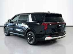 Kia Carnival Hybrid LXS FWD 2026 — side view